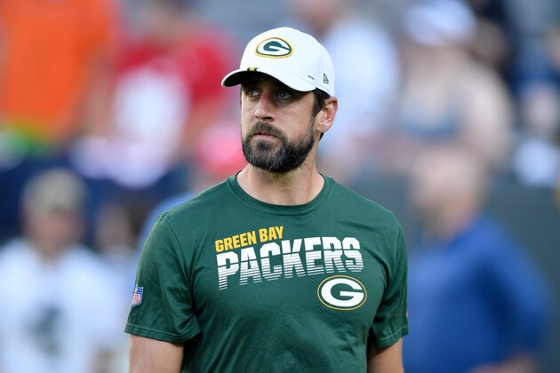 GREEN BAY, WISCONSIN - AUGUST 08:  Aaron Rodgers #12 of the Green Bay Packers walks across the field before a preseason game against the Houston Texans at Lambeau Field on August 08, 2019 in Green Bay, Wisconsin. (Photo by Quinn Harris/Getty Images)
