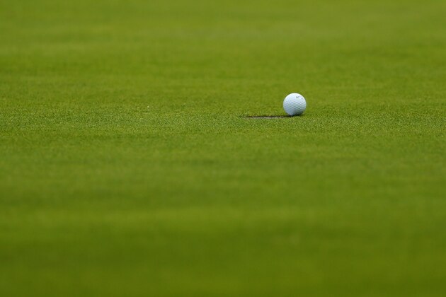 PORTRUSH, NORTHERN IRELAND - JULY 20: The ball of Jon Rahm of Spain sits on the edge of the hole on the 18th green during the third round of the 148th Open Championship held on the Dunluce Links at Royal Portrush Golf Club on July 20, 2019 in Portrush, United Kingdom. (Photo by Francois Nel/Getty Images)