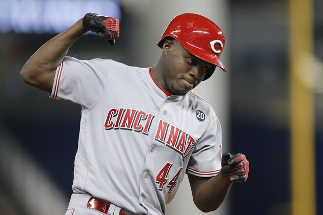 MIAMI, FLORIDA - AUGUST 28:  Aristides Aquino #44 of the Cincinnati Reds celebrates after hitting a three-run home run against the Miami Marlins during the first inning at Marlins Park on August 28, 2019 in Miami, Florida. (Photo by Michael Reaves/Getty Images)