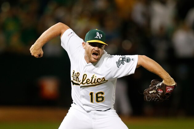 OAKLAND, CALIFORNIA - AUGUST 21: Closing pitcher Liam Hendriks #16 of the Oakland Athletics celebrates after the final out of a win against the New York Yankees at Ring Central Coliseum on August 21, 2019 in Oakland, California. (Photo by Lachlan Cunningham/Getty Images)