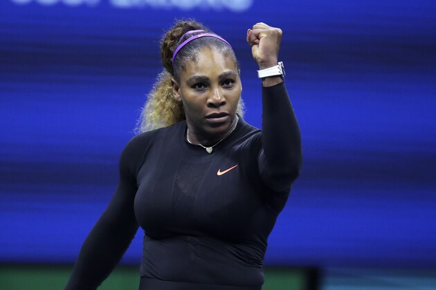 Serena Williams, of the United States, raises her fist after defeating Caty McNally, of the United States, during the second round of the U.S. Open tennis tournament in New York, Wednesday, Aug. 28, 2019. Williams won 5-7, 6-3, 6-1. (AP Photo/Charles Krupa)