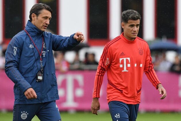 Bayern Munich's new Brazilian midfielder Philippe Coutinho (R) and head coach Niko Kovac   walk across the pitch during a training session at the team's training ground in Munich, southern Germany on August 20, 2019. (Photo by Christof STACHE / AFP)        (Photo credit should read CHRISTOF STACHE/AFP/Getty Images)