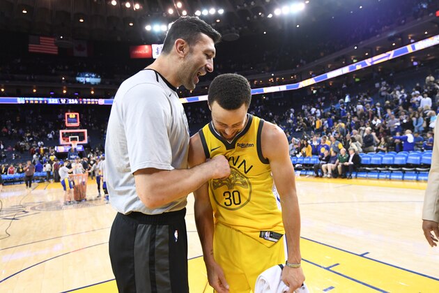 OAKLAND, CA - MARCH 24: Zaza Pachulia #27 of the Detroit Pistons and Stephen Curry #30 of the Golden State Warriors talk after a game on March 24, 2019 at ORACLE Arena in Oakland, California. NOTE TO USER: User expressly acknowledges and agrees that, by downloading and or using this photograph, user is consenting to the terms and conditions of Getty Images License Agreement. Mandatory Copyright Notice: Copyright 2019 NBAE (Photo by Noah Graham/NBAE via Getty Images)