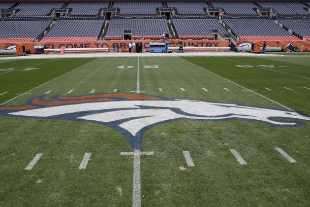 The Denver Broncos logo is painted on the field at Mile High Stadium prior to an NFL football game against the Los Angeles Chargers, Monday, Sept. 11, 2017, in Denver. (AP Photo/Jack Dempsey)