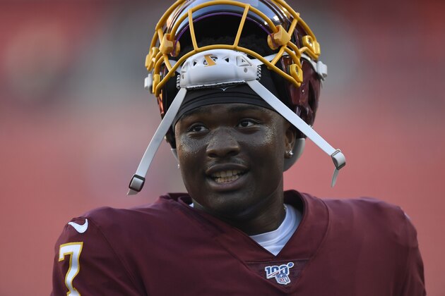 Washington Redskins quarterback Dwayne Haskins (7) in between drills before the start of an NFL preseason football game against the Baltimore Ravens at FedEx Field in Landover, Md., Thursday, Aug. 29, 2019. (AP Photo/Susan Walsh)
