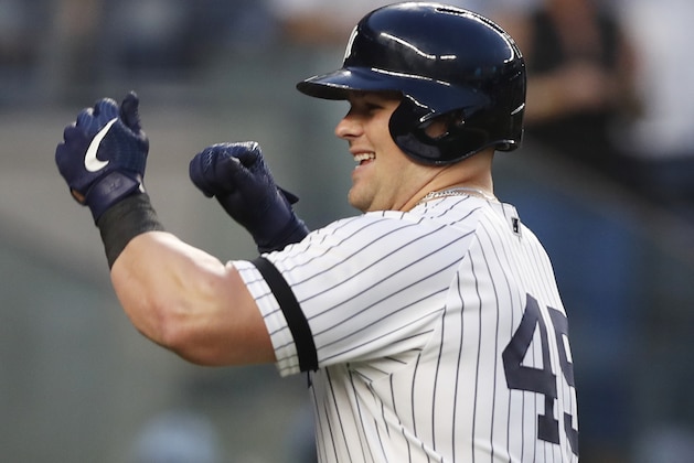 New York Yankees' Luke Voit ceclebrates his fourth-inning solo home run in a baseball game against the Boston Red Sox, Sunday, June 2, 2019, in New York. (AP Photo/Kathy Willens)