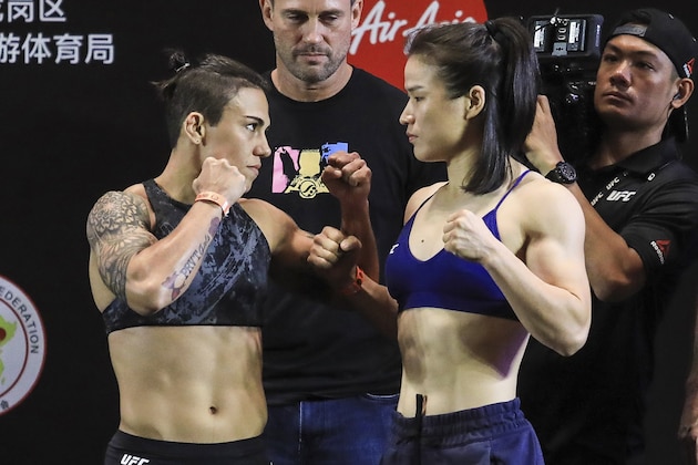 Zhang Weili (R) of China and Jessica Andrade of Brazil face off during their weigh-in ahead of the UFC Fight Night main event fight in Shenzhen in China's southern Guangdong province on August 30, 2019. - UFC Fight Night will take place on August 31. (Photo by STR / AFP) / China OUT        (Photo credit should read STR/AFP/Getty Images)