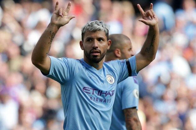 Manchester City's Argentinian striker Sergio Aguero celebrates after scoring their third goal during the English Premier League football match between Manchester City and Brighton and Hove Albion at the Etihad Stadium in Manchester, north west England, on August 31, 2019. (Photo by Lindsey Parnaby / AFP) / RESTRICTED TO EDITORIAL USE. No use with unauthorized audio, video, data, fixture lists, club/league logos or 'live' services. Online in-match use limited to 120 images. An additional 40 images may be used in extra time. No video emulation. Social media in-match use limited to 120 images. An additional 40 images may be used in extra time. No use in betting publications, games or single club/league/player publications. /         (Photo credit should read LINDSEY PARNABY/AFP/Getty Images)