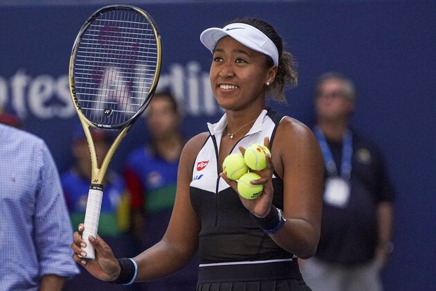 Naomi Osaka of Japan reacts after defeating Magda Linette of Poland during their Round 2 women's Singles tennis match at the 2019 US Open at the USTA Billie Jean King National Tennis Center in New York on August 29, 2019. (Photo by Kena Betancur / AFP)        (Photo credit should read KENA BETANCUR/AFP/Getty Images)