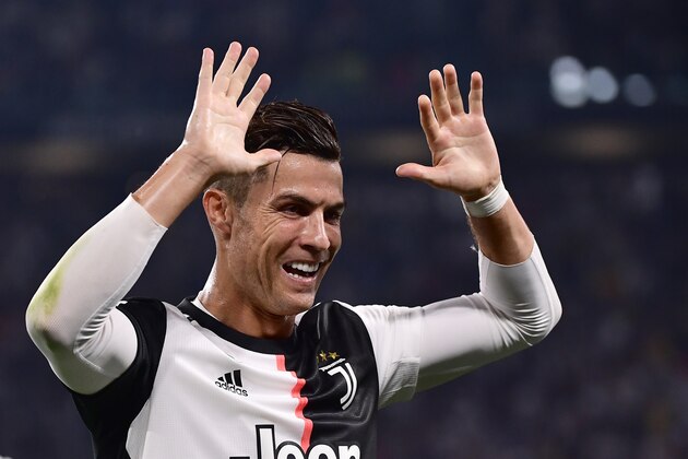 Juventus' Portuguese forward Cristiano Ronaldo celebrates his team's opening goal during the Italian Serie A football match Juventus vs Napoli on August 31, 2019 at the Juventus stadium in Turin. (Photo by Marco Bertorello / AFP)        (Photo credit should read MARCO BERTORELLO/AFP/Getty Images)