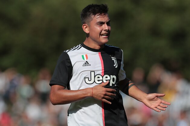 TURIN, ITALY - AUGUST 14:  Paulo Dybala of Juventus gestures during the Pre-season Friendly match betewwen Juventus A v Juventus B on August 14, 2019 in Villar Perosa near Turin, Italy.  (Photo by Emilio Andreoli/Getty Images)