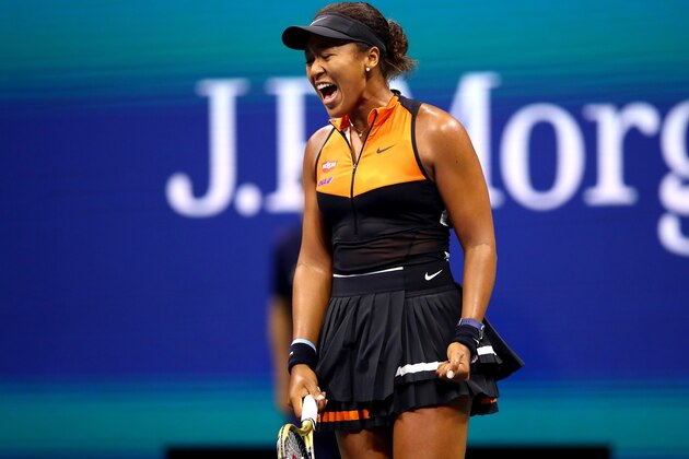 NEW YORK, NEW YORK - AUGUST 31: Naomi Osaka of Japan reacts during her Women's Singles third round match against Cori Gauff of the United States on day six of the 2019 US Open at the USTA Billie Jean King National Tennis Center on August 31, 2019 in Queens borough of New York City. (Photo by Clive Brunskill/Getty Images)