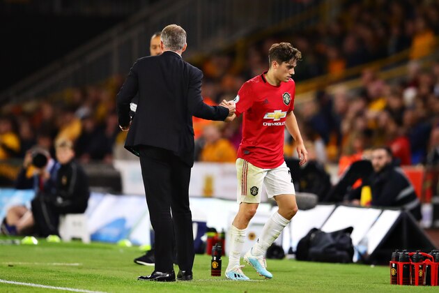 WOLVERHAMPTON, ENGLAND - AUGUST 19: Daniel James of Manchester United shakes hands with Manager of Manchester United, Ole Gunnar Solskjaer after being replaced as a substitute during the Premier League match between Wolverhampton Wanderers and Manchester United at Molineux on August 19, 2019 in Wolverhampton, United Kingdom. (Photo by Chris Brunskill/Fantasista/Getty Images)