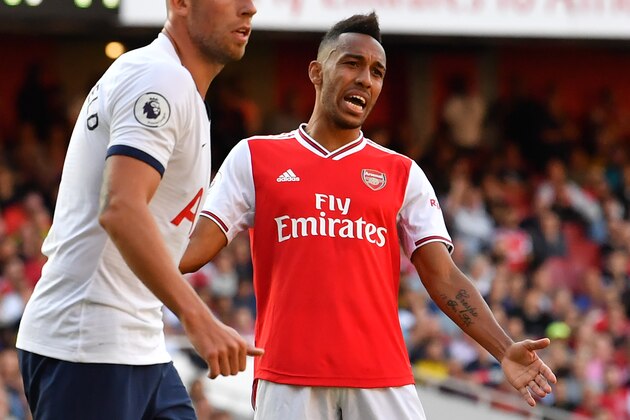 Arsenal's Gabonese striker Pierre-Emerick Aubameyang reacts during the English Premier League football match between Arsenal and Tottenham Hotspur at the Emirates Stadium in London on September 1, 2019. (Photo by Ben STANSALL / AFP) / RESTRICTED TO EDITORIAL USE. No use with unauthorized audio, video, data, fixture lists, club/league logos or 'live' services. Online in-match use limited to 120 images. An additional 40 images may be used in extra time. No video emulation. Social media in-match use limited to 120 images. An additional 40 images may be used in extra time. No use in betting publications, games or single club/league/player publications. / (Photo credit should read BEN STANSALL/AFP/Getty Images) Arsenal's Gabonese striker Pierre-Emerick Aubameyang reacts during the English Premier League football match between Arsenal and Tottenham Hotspur at the Emirates Stadium in London on September 1, 2019. (Photo by Ben STANSALL / AFP) / RESTRICTED TO EDITORIAL USE. No use with unauthorized audio, video, data, fixture lists, club/league logos or 'live' services. Online in-match use limited to 120 images. An additional 40 images may be used in extra time. No video emulation. Social media in-match use limited to 120 images. An additional 40 images may be used in extra time. No use in betting publications, games or single club/league/player publications. / (Photo credit should read BEN STANSALL/AFP/Getty Images)