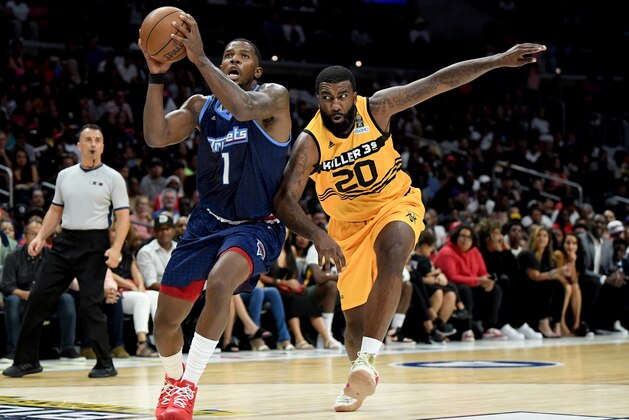 LOS ANGELES, CALIFORNIA - SEPTEMBER 01: Joe Johnson #1 of the Triplets drives past Donte Greene #20 of Killer 3s during the BIG3 Championship at Staples Center on September 01, 2019 in Los Angeles, California. (Photo by Harry How/BIG3 via Getty Images)