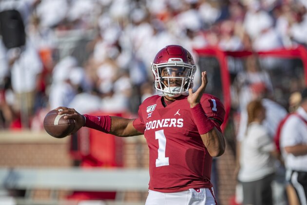 Oklahoma quarterback Jalen Hurts (1) warms up before the start of an NCAA college football game against Houston in Norman, Okla., Sunday, Sept. 1, 2019. (AP Photo/Alonzo Adams)