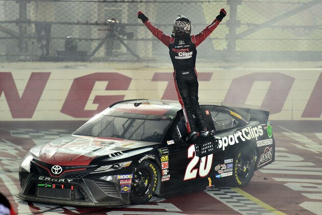 DARLINGTON, SOUTH CAROLINA - SEPTEMBER 02: Erik Jones, driver of the #20 Sport Clips Throwback Toyota, celebrates after winning the Monster Energy NASCAR Cup Series Bojangles' Southern 500 at Darlington Raceway on September 02, 2019 in Darlington, South Carolina. (Photo by Jared C. Tilton/Getty Images)