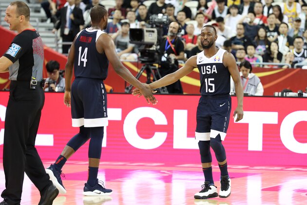 SHANGHAI, CH - SEPTEMBER 1:  Kemba Walker #15 of USA hi-fives teammates in game against the Czech Republic during the First Round of the 2019 FIBA Basketball World Cup on September 1, 2019 at the Shanghai Oriental Sports Center in Shanghai, China. NOTE TO USER: User expressly acknowledges and agrees that, by downloading and or using this photograph, User is consenting to the terms and conditions of the Getty Images License Agreement. Mandatory Copyright Notice: Copyright 2019 NBAE  (Photo by Nathaniel S. Butler/NBAE via Getty Images)