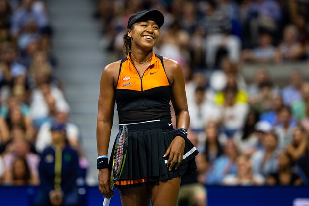 NEW YORK, NEW YORK - AUGUST 31: Naomi Osaka of Japan smiles after beating Cori Gauff of the United States in the third round on Arthur Ashe Stadium at the USTA Billie Jean King National Tennis Center on August 31, 2019 in New York City. (Photo by TPN/Getty Images)
