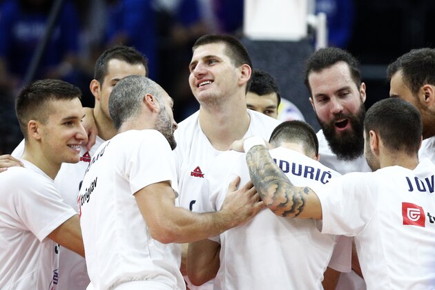 FOSHAN, CHINA - SEPTEMBER 02: #15 Nikola Jokic, #7 Bogdan Bogdanovic, #13 Miroslav Raduljica and team mates of the Serbia National Team react during the match against the Philippines National Team during the 1st round of 2019 FIBA World Cup at GBA International Sports and Cultural Center on September 02, 2019 in Foshan, China. (Photo by Zhong Zhi/Getty Images)