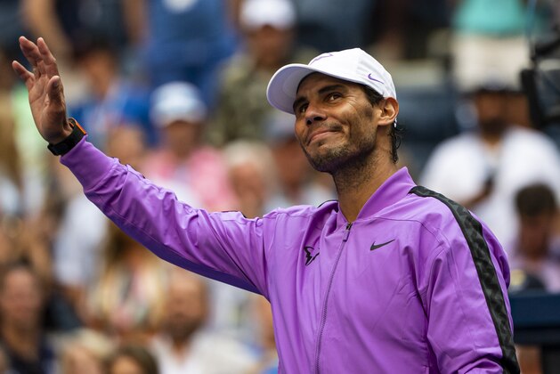 NEW YORK, NEW YORK - AUGUST 31: Rafael Nadal of Spain hits autographed balls into the crowd after his victory over Hyeon Chung of South Korea in the third round on Arthur Ashe Stadium at the USTA Billie Jean King National Tennis Center on August 31, 2019 in New York City. (Photo by TPN/Getty Images)