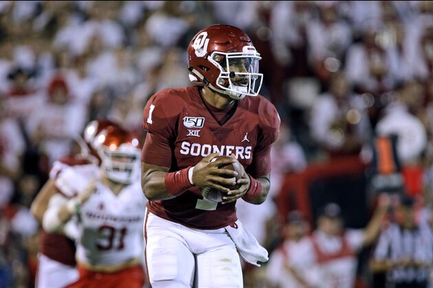 NORMAN, OK - SEPTEMBER 1:  Quarterback Jalen Hurts #1 of the Oklahoma Sooners runs in the backfield against the Houston Cougars at Gaylord Family Oklahoma Memorial Stadium on September 1, 2019 in Norman, Oklahoma. The Sooners defeated the Cougars 49-31. (Photo by Brett Deering/Getty Images)