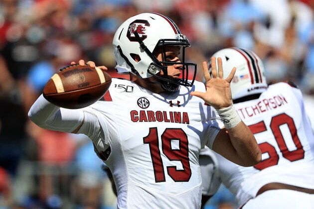CHARLOTTE, NORTH CAROLINA - AUGUST 31: Jake Bentley #19 of the South Carolina Gamecocks drops back to pass against the North Carolina Tar Heels during the Belk College Kickoff game at Bank of America Stadium on August 31, 2019 in Charlotte, North Carolina. (Photo by Streeter Lecka/Getty Images)