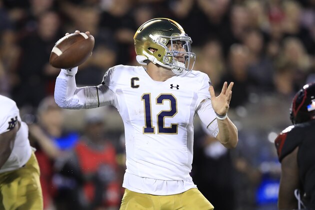 LOUISVILLE, KENTUCKY - SEPTEMBER 02:   Ian Book #12 of the Notre Dame Fighting Irish throws the ball against the Louisville Cardinals on September 02, 2019 in Louisville, Kentucky. (Photo by Andy Lyons/Getty Images)