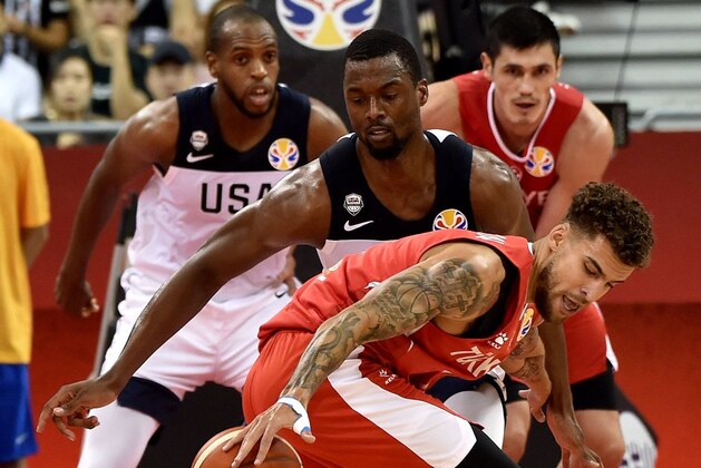 Turkey's Scott Wilbekin dribbles the ball during the Basketball World Cup Group E game between US and Turkey in Shanghai on September 3, 2019. (Photo by HECTOR RETAMAL / AFP)        (Photo credit should read HECTOR RETAMAL/AFP/Getty Images)