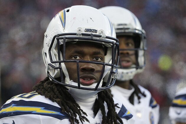 Los Angeles Chargers running back Melvin Gordon watches from the sideline during the second half of an NFL divisional playoff football game against the New England Patriots, Sunday, Jan. 13, 2019, in Foxborough, Mass. (AP Photo/Steven Senne)