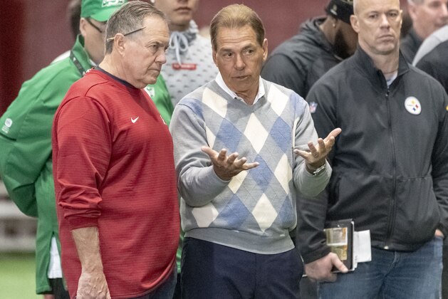 New England Patriots head coach Bill Belichick (sporting an Alabama windbreaker) talks with Alabama football coach Nick Saban at the Alabama NFL Pro Day, Tuesday, March 19, 2019, in Tuscaloosa, Ala. (AP Photo/Vasha Hunt)