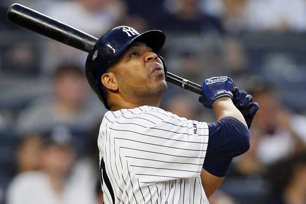 NEW YORK, NY - AUGUST 2:  Edwin Encarnacion #30 of the New York Yankees watches his long fly ball hit during an MLB baseball game against the Boston Red Sox on August 2, 2019 at Yankee Stadium in the Bronx borough of New York City. Yankees won 4-2. (Photo by Paul Bereswill/Getty Images)