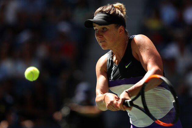 NEW YORK, NEW YORK - SEPTEMBER 03: Elina Svitolina of the of the Ukraine returns a shot during her Women's Singles quarterfinal match against Johanna Konta of Great Britain on day nine of the 2019 US Open at the USTA Billie Jean King National Tennis Center on September 03, 2019 in the Queens borough of New York City. (Photo by Matthew Stockman/Getty Images)