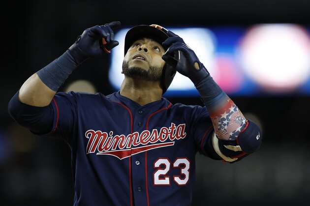 Minnesota Twins designated hitter Nelson Cruz looks skyward after his solo home run during the eighth inning of a baseball game against the Detroit Tigers, Saturday, Aug. 31, 2019, in Detroit. (AP Photo/Carlos Osorio)