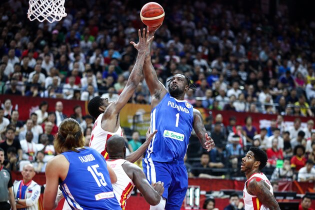 FOSHAN, CHINA - SEPTEMBER 04: #1 Andray Blatche of the Philippines National Team in action against #2 Yanick Moreira of the Angola National Team during the 1st round of 2019 FIBA World Cup at GBA International Sports and Cultural Center on September 4, 2019 in Foshan, China. (Photo by Zhong Zhi/Getty Images)