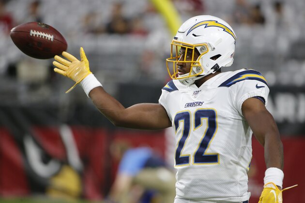 Los Angeles Chargers running back Justin Jackson (22) warms up prior to an NFL preseason football game against the Arizona Cardinals, Thursday, Aug. 8, 2019, in Glendale, Ariz. (AP Photo/Rick Scuteri)