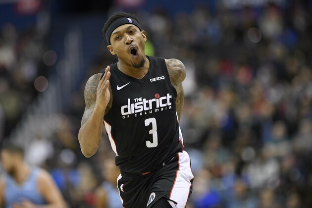 Washington Wizards guard Bradley Beal (3) reacts after he made a basket during the second half of an NBA basketball game against the Memphis Grizzlies, Saturday, March 16, 2019, in Washington. The Wizards won 135-128. (AP Photo/Nick Wass)