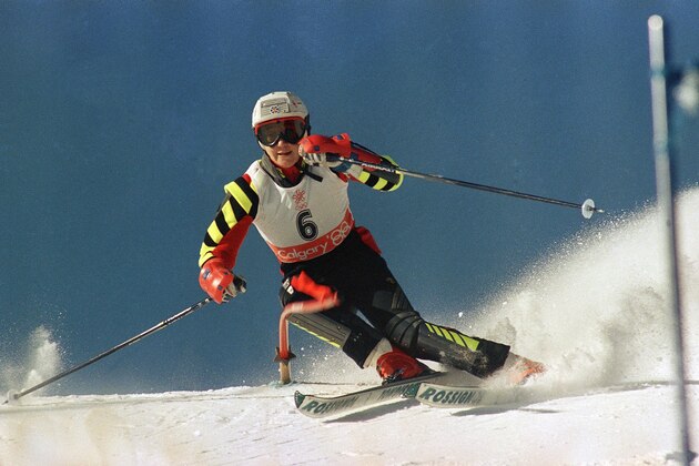 FILE - In this Friday, Feb. 26, 1988 file photo, Spanish skier Blanca Fernandez Ochoa speeds down the slope during the first run for the Olympic slalom competition,  at Mt. Allan in Nakiska, Alberta. A search squad of hundreds is combing a mountainous area outside Madrid 10 days after former alpine ski racer and Olympic medalist Blanca Fernandez Ochoa went missing. Spain's National Police said Fernandez was last spotted on surveillance video at a shopping center on Aug. 24, 2019. (AP Photo/Dieter Endlicher, File)