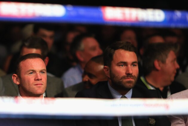 MANCHESTER, ENGLAND - SEPTEMBER 24: Manchester United and England footballer Wayne Rooney (L) and promoter Eddie Hearn look on from ringside at Manchester Arena on September 24, 2016 in Manchester, England. (Photo by Ben Hoskins/Getty Images) MANCHESTER, ENGLAND - SEPTEMBER 24: Manchester United and England footballer Wayne Rooney (L) and promoter Eddie Hearn look on from ringside at Manchester Arena on September 24, 2016 in Manchester, England. (Photo by Ben Hoskins/Getty Images)