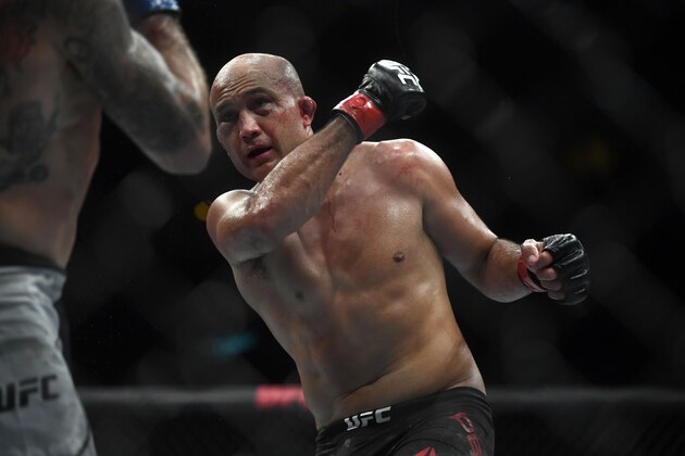 US fighter BJ Penn (R) competes against US fighter Clay Guida (L) during their men's lightweight bout at the Ultimate Fighting Championship 237 event (UFC 237) at Jeunesse Arena in Rio de Janeiro on May 11, 2019. (Photo by Mauro Pimentel / AFP) / The erroneous mention[s] appearing in the metadata of this photo by Mauro Pimentel has been modified in AFP systems in the following manner: [May 11, 2019] instead of [May 11, 2018]. Please immediately remove the erroneous mention[s] from all your online services and delete it (them) from your servers. If you have been authorized by AFP to distribute it (them) to third parties, please ensure that the same actions are carried out by them. Failure to promptly comply with these instructions will entail liability on your part for any continued or post notification usage. Therefore we thank you very much for all your attention and prompt action. We are sorry for the inconvenience this notification may cause and remain at your disposal for any further information you may r