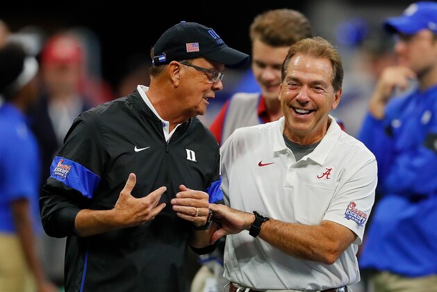 ATLANTA, GEORGIA - AUGUST 31:  Head coach Nick Saban of the Alabama Crimson Tide and head coach David Cutcliffe of the Duke Blue Devils enjoy a laugh during pregame warmups at Mercedes-Benz Stadium on August 31, 2019 in Atlanta, Georgia. (Photo by Kevin C. Cox/Getty Images)