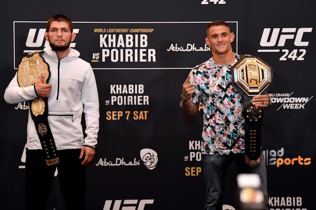 ABU DHABI, UNITED ARAB EMIRATES - SEPTEMBER 05:  (L-R) Khabib Nurmagomedov of Russia and Dustin Poirier pose for media during the UFC 242 Ultimate Media Day at the Yas Hotel on September 5, 2019 in Abu Dhabi, United Arab Emirates. (Photo by Jeff Bottari/Zuffa LLC/Zuffa LLC via Getty Images)