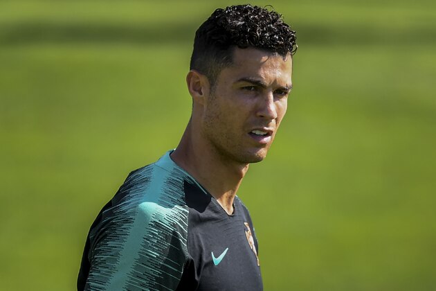 Portugal's forward Cristiano Ronaldo looks on during a training session at