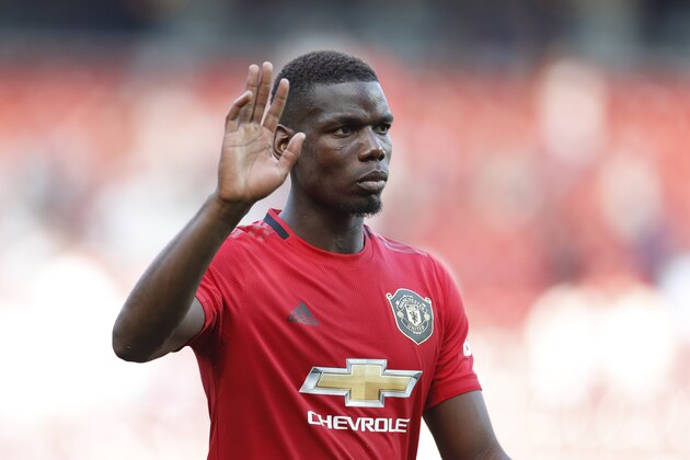 Manchester United's Paul Pogba leaves the pitch at the end of the English Premier League soccer match between Manchester United and Crystal Palace at Old Trafford in Manchester, England Saturday, Aug, 24, 2019. (AP Photo/Alastair Grant)