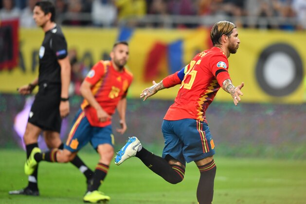Spain's defender Sergio Ramos (R) celebrates scoring with his team-mates during the Euro 2020 football qualification match between Romania and Spain in Bucharest, Romania, on September 5, 2019. (Photo by Daniel MIHAILESCU / AFP)        (Photo credit should read DANIEL MIHAILESCU/AFP/Getty Images)