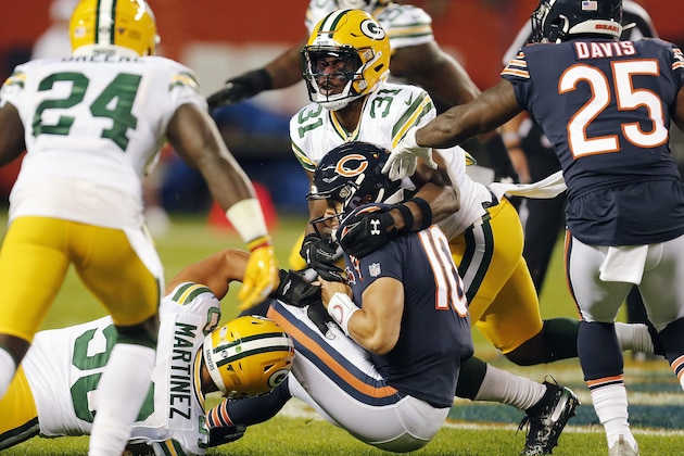 CHICAGO, ILLINOIS - SEPTEMBER 05: Mitchell Trubisky #10 of the Chicago Bears was brought down by Blake Martinez #50 and Adrian Amos #31 of the Green Bay Packers during the first quarter of a game at Soldier Field on September 05, 2019 in Chicago, Illinois. (Photo by Nuccio DiNuzzo/Getty Images)