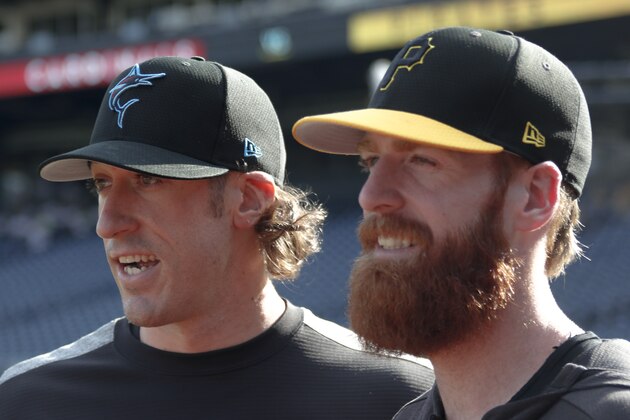 Pittsburgh Pirates' Colin Moran, right, stands with his brother Brian Moran, a pitcher for the Miami Marlins, before their teams play against each other in a baseball game, Wednesday, Sept. 4, 2019, in Pittsburgh. (AP Photo/Keith Srakocic)