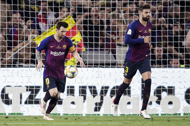 SEVILLIA, SPAIN - MAY 25: (L-R) Lionel Messi of FC Barcelona, Gerard Pique of FC Barcelona celebrates goal 1-2 during the Spanish Copa del Rey  match between FC Barcelona v Valencia at the Benito Villamarin Stadium on May 25, 2019 in Sevillia Spain (Photo by David S. Bustamante/Soccrates/Getty Images)