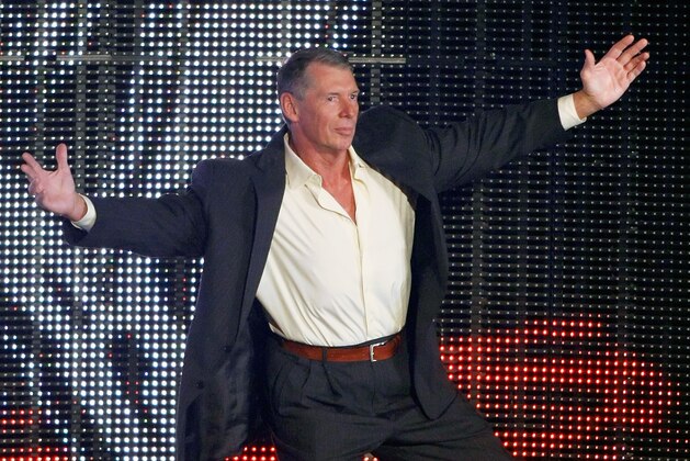LAS VEGAS - AUGUST 24:  World Wrestling Entertainment Inc. Chairman Vince McMahon is introduced during the WWE Monday Night Raw show at the Thomas & Mack Center August 24, 2009 in Las Vegas, Nevada.  (Photo by Ethan Miller/Getty Images)