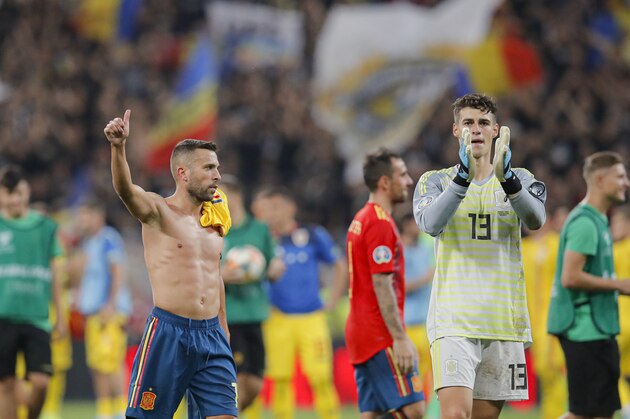 Spain's Alvaro Morata, left and Spain's goalkeeper Kepa salute spanish fans at the end of the Euro 2020 group F qualifying soccer match between Romania and Spain, at the National Arena stadium in Bucharest, Romania, Thursday, Sept. 5, 2019. (AP Photo/Vadim Ghirda)